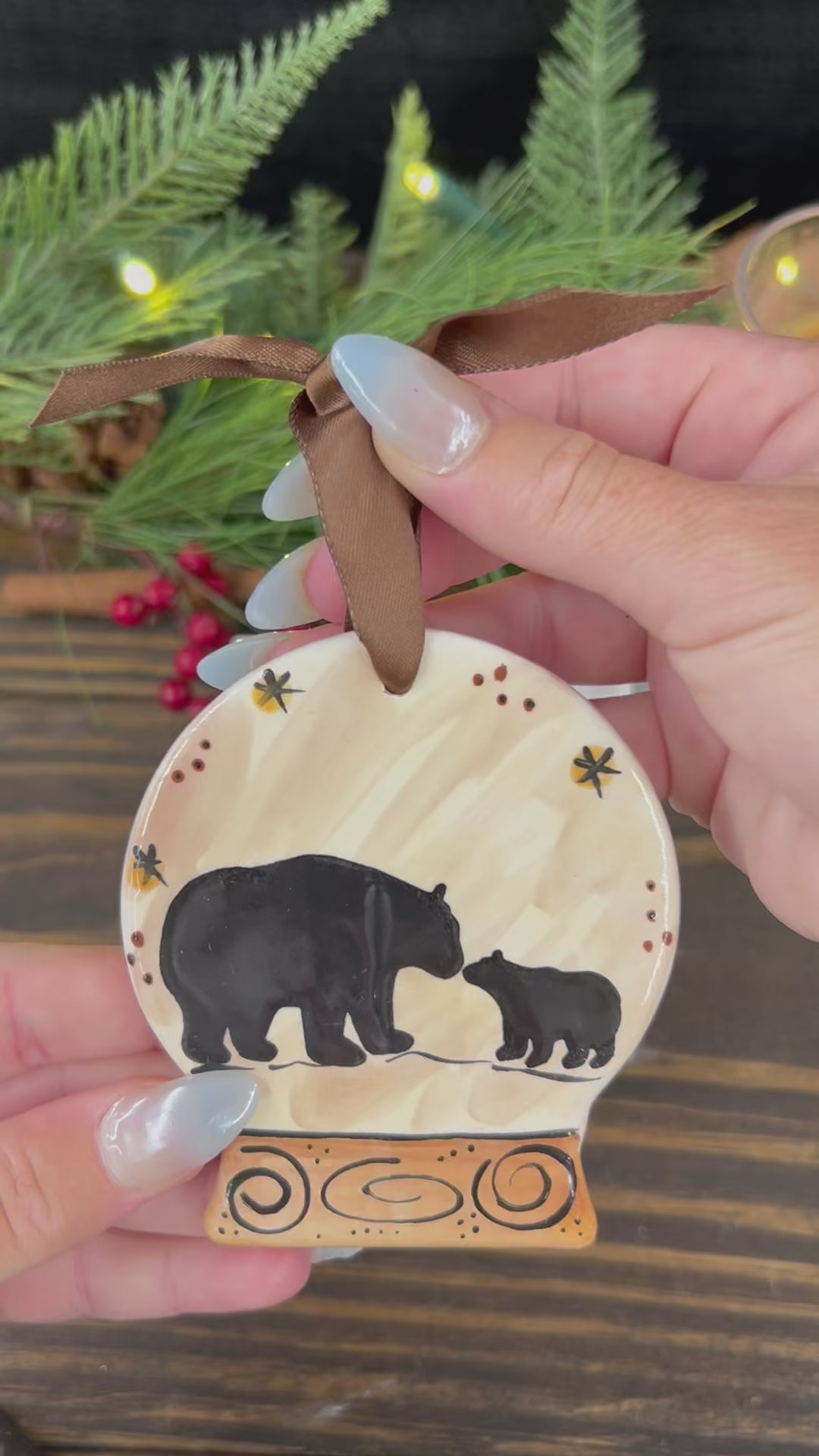 Load video: Snow Globe Bear Family